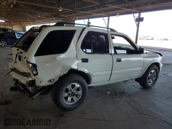 2000 Isuzu Rodeo S z VIN 4S2CK58W3Y4323965, wystawiony jako Copart lot #61189435 z przebiegiem 211 726 mil mil oraz Szkoda całkowita • Salvage title. Historia ofert i sprzedaży dostępna na DreamBid. Obrazek 3.