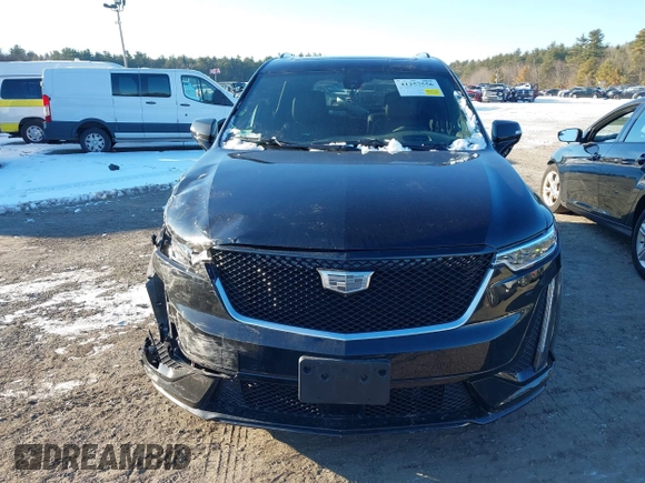 2024 Cadillac XT6 AWD Sport z VIN 1GYKPHRS4RZ700307, wystawiony jako IAAI lot #41257556 z przebiegiem 18 292 mil mil oraz . Historia ofert i sprzedaży dostępna na DreamBid. Obrazek 12.