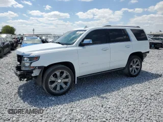 2017 Chevrolet Tahoe Premier with VIN 1GNSKCKC4HR336549, listed as a Copart auction lot 56563765 with 136,763 mi miles and Salvage title. Bid and sale history available at DreamBid. Image 1.