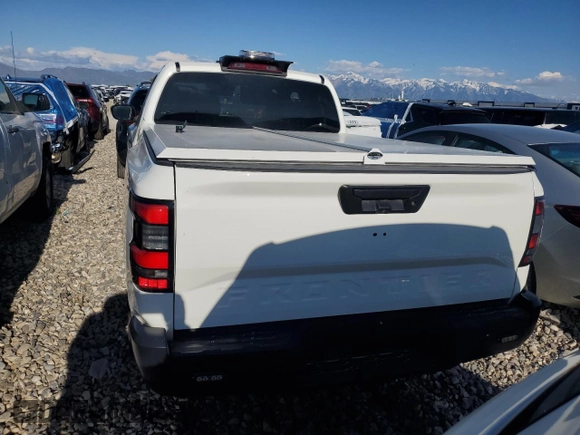2024 Nissan Frontier S with VIN 1N6ED1CL9RN657883, listed as a Copart auction lot 52134545 with 7,602 mi miles and Clean title. Bid and sale history available at DreamBid. Image 6.