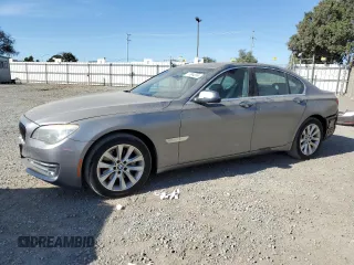 2014 BMW 7 Series 740i with VIN WBAYA6C55ED144487, listed as a Copart auction lot 77044014 with 86,149 mi miles and Salvage Title. Bid and sale history available at carsss.com. Image 1.
