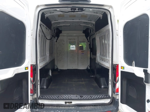 2019 Ford Transit with VIN 1FTYR2XM1KKB75460, listed as a IAAI auction lot 42682602 with 62,669 mi miles and . Bid and sale history available at DreamBid. Image 18.