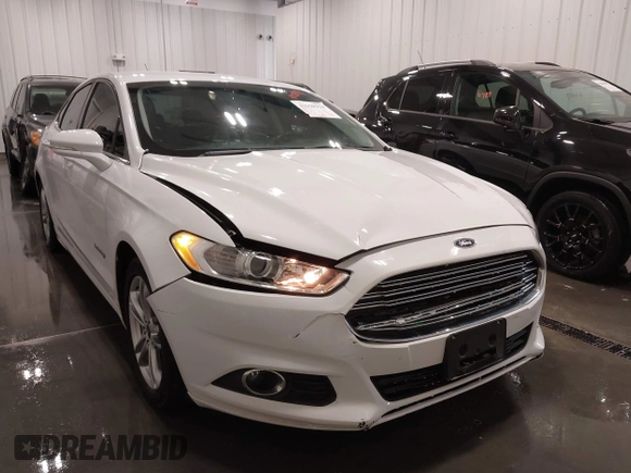 2015 Ford Fusion SE Hybrid with VIN 3FA6P0LU8FR215788, listed as a IAAI auction lot 42038194 with 136,949 mi miles and . Bid and sale history available at DreamBid. Image 6.