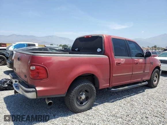 2001 Ford F-150 XLT с VIN 1FTRW07L01KF03457, выставлен на аукционе Copart как лот 60086725 с пробегом 205 917 миль миль и Списание • Salvage title. История ставок и продаж доступна на DreamBid. Изображение 3.