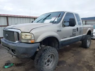 1999 Ford Super Duty F-250 XL with VIN 1FTNX21F1XED40173, listed as a IAAI auction lot 41712778 with 166,586 mi miles. Bid and sale history available at carsss.com. Image 2.