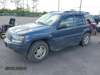 2004 Jeep Grand Cherokee Laredo with VIN 1J4GW48S24C101792, listed as a IAAI auction lot 41995351 with 138,317 mi miles. Bid and sale history available at carsss.com. Image 2.
