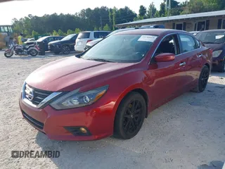 2016 Nissan Altima SR with VIN 1N4AL3AP3GC161353, listed as a IAAI auction lot 42148618 with 125,797 mi miles and . Bid and sale history available at DreamBid. Image 2.