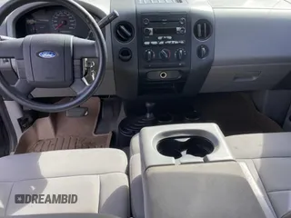 2005 Ford F-150 STX with VIN 1FTRX14W15NB53391, listed as a Copart auction lot 50452905 with 169,403 mi miles and Salvage Title. Bid and sale history available at carsss.com. Image 9.