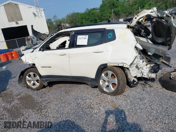2018 Jeep Compass Latitude with VIN 3C4NJDBB4JT270975, listed as a IAAI auction lot 42477582 with 98,629 mi miles and . Bid and sale history available at DreamBid. Image 13.