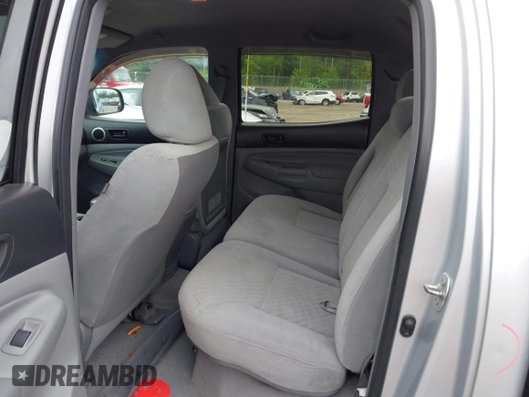 2011 Toyota Tacoma with VIN 3TMLU4EN4BM069898, listed as a IAAI auction lot 42371500 with 201,538 mi miles and . Bid and sale history available at DreamBid. Image 8.