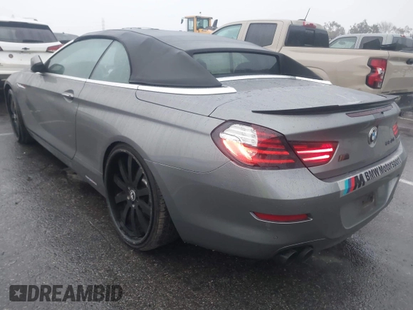 2012 BMW 6 Series 650i with VIN WBALZ3C5XCDL70748, listed as a IAAI auction lot 41502640 with 102,519 mi miles. Bid and sale history available at carsss.com. Image 3.