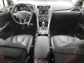2016 Ford Fusion Titanium with VIN 3FA6P0K90GR110354, listed as a Copart auction lot 58849025 with 148,662 mi miles and Salvage title. Bid and sale history available at DreamBid. Image 8.