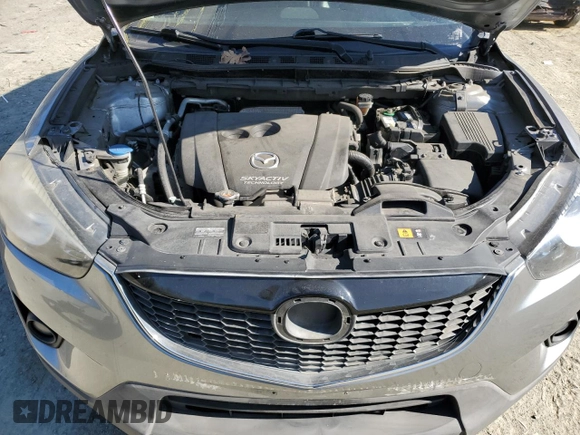 2015 Mazda CX-5 Grand Touring with VIN JM3KE4DY5F0460465, listed as a Copart auction lot 46392605 with 103,185 mi miles and Salvage Title. Bid and sale history available at carsss.com. Image 12.