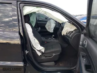 2019 Jeep Grand Cherokee Laredo E with VIN 1C4RJEAGXKC571770, listed as a IAAI auction lot 41677487 with 113,089 mi miles. Bid and sale history available at carsss.com. Image 5.