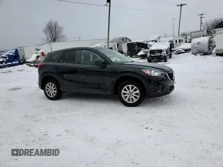 2015 Mazda CX-5 Touring with VIN JM3KE4CY1F0458911, listed as a Copart auction lot 87666255 with 0 mi miles and Salvage Title. Bid and sale history available at carsss.com. Image 15.