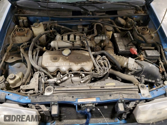 1994 Ford Escort z VIN 1FARP14J9RW318226, wystawiony jako Copart lot #60507135 z przebiegiem 69 041 mil mil oraz Szkoda całkowita • Salvage title. Historia ofert i sprzedaży dostępna na DreamBid. Obrazek 11.
