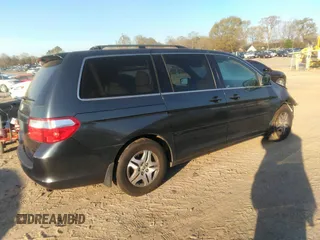 2006 Honda Odyssey EX-L with VIN 5FNRL386X6B452864, listed as a IAAI auction lot 41878327 with 197,923 mi miles. Bid and sale history available at carsss.com. Image 4.