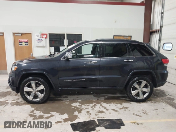 2014 Jeep Grand Cherokee Overland with VIN 1C4RJFCT9EC234270, listed as a IAAI auction lot 41938621 with 144,541 mi miles and . Bid and sale history available at DreamBid. Image 14.