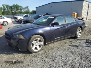 2012 Dodge Charger Police z VIN 2C3CDXAT1CH201509, wystawiony jako Copart lot #60261305 z przebiegiem 95 733 mil mil oraz Czysty tytuł • Clean title. Historia ofert i sprzedaży dostępna na DreamBid. Obrazek 1.