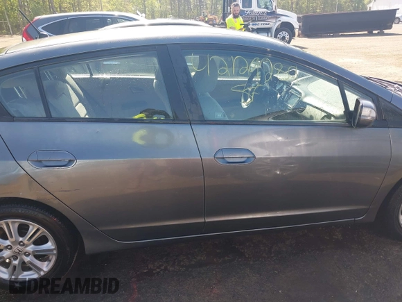 2010 Honda Insight EX with VIN JHMZE2H72AS021555, listed as a IAAI auction lot 42129289 with 172,829 mi miles and . Bid and sale history available at DreamBid. Image 14.