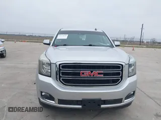 2015 GMC Yukon SLT with VIN 1GKS1BKC3FR253184, listed as a IAAI auction lot 41574610 with 152,543 mi miles. Bid and sale history available at carsss.com. Image 6.