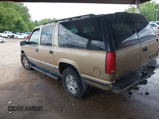 1999 Chevrolet Suburban with VIN 1GNFK16RXXJ416360, listed as a IAAI auction lot 42670294 with 319,691 mi miles and . Bid and sale history available at DreamBid. Image 3.