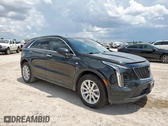 2023 Cadillac XT4 FWD Luxury with VIN 1GYAZAR46PF178003, listed as a Copart auction lot 59121545 with 42,000 mi miles and Salvage title. Bid and sale history available at DreamBid. Image 4.