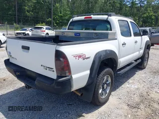 2009 Toyota Tacoma PreRunner with VIN 3TMJU62NX9M091048, listed as a IAAI auction lot 42272791 with 208,257 mi miles and . Bid and sale history available at DreamBid. Image 4.