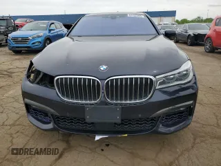 2018 BMW 7 Series 750i xDrive z VIN WBA7B0C52JG527205, wystawiony jako Copart lot #57452265 z przebiegiem 120 655 mil mil oraz Czysty tytuł • Clean title. Historia ofert i sprzedaży dostępna na DreamBid. Obrazek 5.