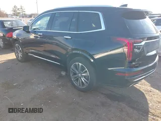 2021 Cadillac XT6 Premium Luxury with VIN 1GYKPFRS9MZ141298, listed as a IAAI auction lot 41304705 with 87,470 mi miles. Bid and sale history available at carsss.com. Image 3.