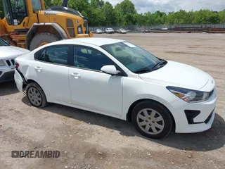 2023 Kia Rio S z VIN 3KPA24ADXPE613557, wystawiony jako IAAI lot #42198794 z przebiegiem 25 275 mil mil oraz . Historia ofert i sprzedaży dostępna na DreamBid. Obrazek 13.