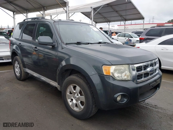 2009 Ford Escape Limited with VIN 1FMCU04759KB64236, listed as a IAAI auction lot 41796461 with 214,949 mi miles. Bid and sale history available at carsss.com. Image 1.