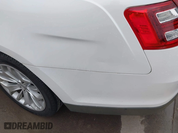 2013 Ford Taurus Limited с VIN 1FAHP2F85DG177024, выставлен на аукционе IAAI как лот 42374078 с пробегом 142 291 миль миль и . История ставок и продаж доступна на DreamBid. Изображение 12.