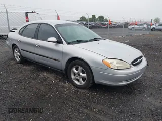 2001 Ford Taurus SES z VIN 1FAFP55U01A102432, wystawiony jako IAAI lot #42202805 z przebiegiem 157 913 mil mil oraz . Historia ofert i sprzedaży dostępna na DreamBid. Obrazek 1.