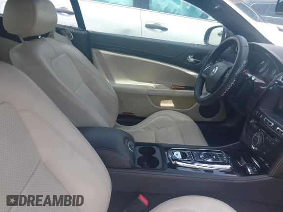 2012 Jaguar XK with VIN SAJWA4FB8CLB47049, listed as a IAAI auction lot 42118136 with 60,953 mi miles. Bid and sale history available at carsss.com. Image 5.