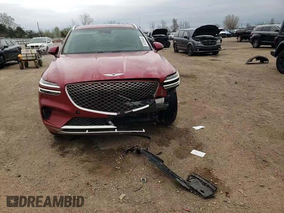 2022 Genesis GV70 2.5T z VIN KMUMADTB5NU072425, wystawiony jako Copart lot #54200445 z przebiegiem 41 199 mil mil oraz Szkoda całkowita • Salvage title. Historia ofert i sprzedaży dostępna na DreamBid. Obrazek 14.