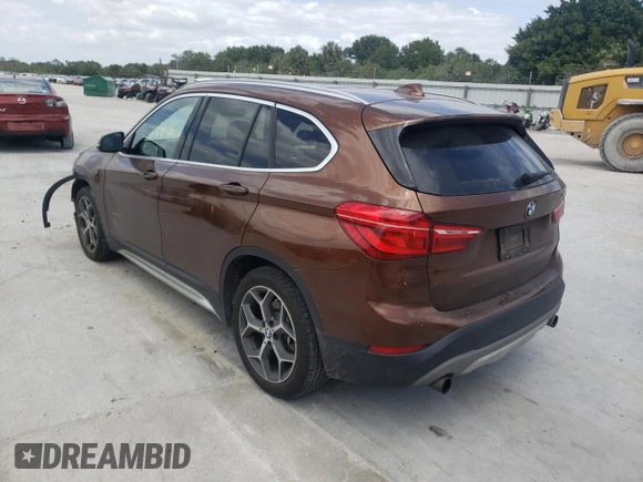 2016 BMW X1 xDrive28i with VIN WBXHT3C31GP880132, listed as a Copart auction lot 69129132 with 74,759 mi miles. Bid and sale history available at carsss.com. Image 3.
