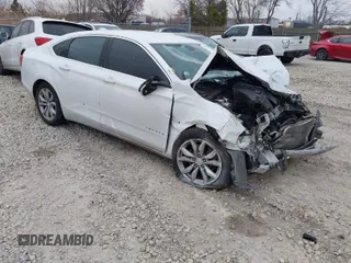 2018 Chevrolet Impala LT z VIN 1G1105S36JU133129, wystawiony jako IAAI lot #41078651 z przebiegiem 100 986 mil mil oraz . Historia ofert i sprzedaży dostępna na DreamBid. Obrazek 1.