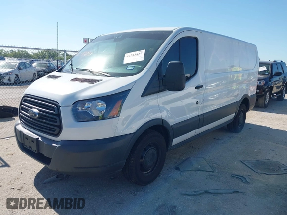 2018 Ford Transit z VIN 1FTYE1ZM0JKB51992, wystawiony jako IAAI lot #42243487 z przebiegiem 123 456 mil mil oraz . Historia ofert i sprzedaży dostępna na DreamBid. Obrazek 2.