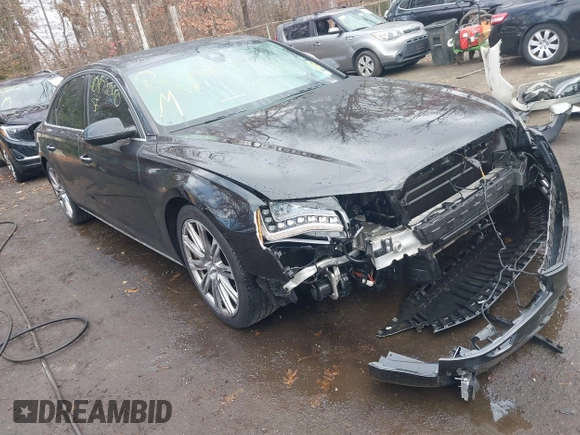 2012 Audi A8 L with VIN WAURVAFD8CN006917, listed as a IAAI auction lot 40877090 with 144,387 mi miles. Bid and sale history available at carsss.com. Image 1.