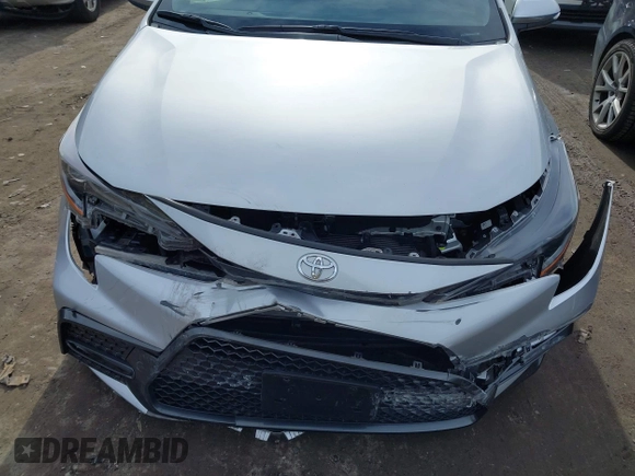 2022 Toyota Corolla SE with VIN JTDS4MCE2NJ087509, listed as a IAAI auction lot 41782078 with 34,627 mi miles and . Bid and sale history available at DreamBid. Image 6.