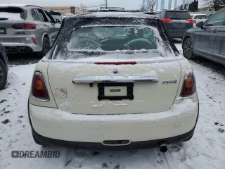 2010 MINI Convertible with VIN WMWMR3C50ATU97287, listed as a Copart auction lot 89116615 with 120,323 mi miles and Salvage Title. Bid and sale history available at DreamBid. Image 6.