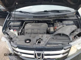 2015 Honda Odyssey Touring Elite with VIN 5FNRL5H97FB124565, listed as a IAAI auction lot 42358412 with 206,444 mi miles and . Bid and sale history available at DreamBid. Image 10.