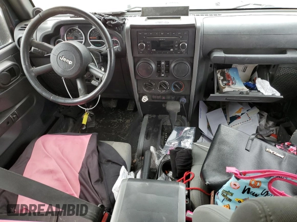 2007 Jeep Wrangler Unlimited Sahara z VIN 1J4GB59147L165439, wystawiony jako Copart lot #50794065 z przebiegiem 255 385 mil mil oraz Szkoda całkowita • Salvage title. Historia ofert i sprzedaży dostępna na DreamBid. Obrazek 8.
