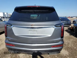 2022 Cadillac XT6 Sport with VIN 1GYKPGRS3NZ142843, listed as a Copart auction lot 47843925 with 26,668 mi miles and Salvage Title. Bid and sale history available at carsss.com. Image 6.