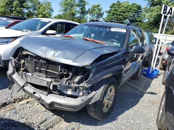 2001 Jeep Grand Cherokee Laredo with VIN 1J4GW48N81C618889, listed as a Copart auction lot 61626534 with 0 mi miles and Salvage Title. Bid and sale history available at carsss.com. Image 1.