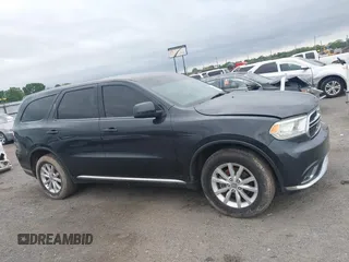 2014 Dodge Durango SXT with VIN 1C4RDJAG7EC307118, listed as a IAAI auction lot 42168781 with 92,977 mi miles and . Bid and sale history available at DreamBid. Image 13.