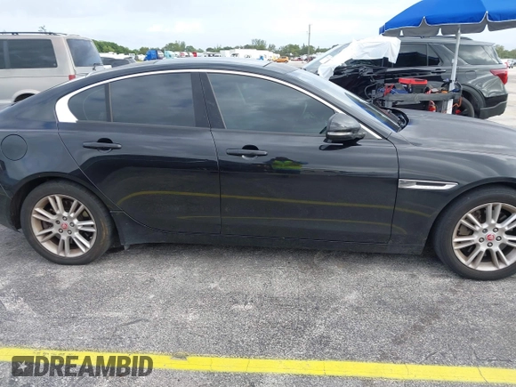 2017 Jaguar XE 25t Premium with VIN SAJAD4BG4HA956227, listed as a IAAI auction lot 40573821 with 152,395 mi miles. Bid and sale history available at carsss.com. Image 13.