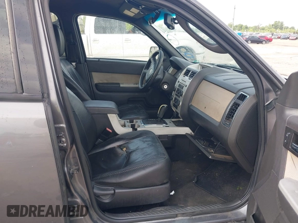 2011 Mercury Mariner Premier with VIN 4M2CN8HG3BKJ07656, listed as a IAAI auction lot 42369474 with 250,352 mi miles and . Bid and sale history available at DreamBid. Image 5.