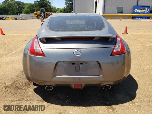 2014 Nissan 370Z Nismo with VIN JN1AZ4EH7EM633324, listed as a Copart auction lot 53812335 with 57,856 mi miles and Salvage Title. Bid and sale history available at DreamBid. Image 6.